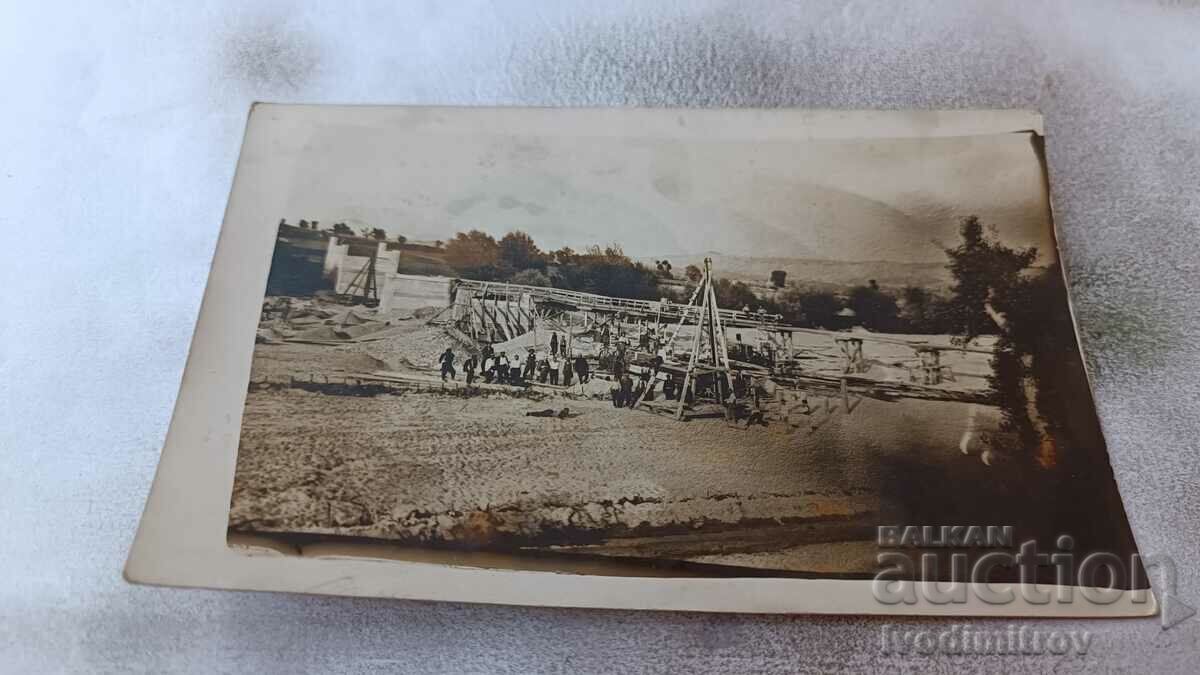 Photo Construction of a bridge over the river Sutliika (Verbitsa)