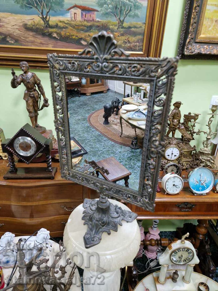 A wonderful large antique Belgian bronze mirror