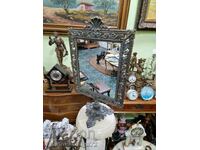 A wonderful large antique Belgian bronze mirror