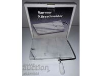 NEW CHEESE CUTTING DEVICE. MARBLE