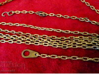 Brass chain for wall clock weights.