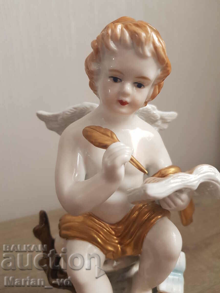 Auction Old porcelain angel figure Auction Old porcelain angel figure