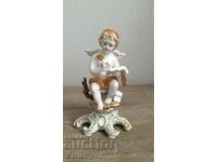 Old porcelain angel figure