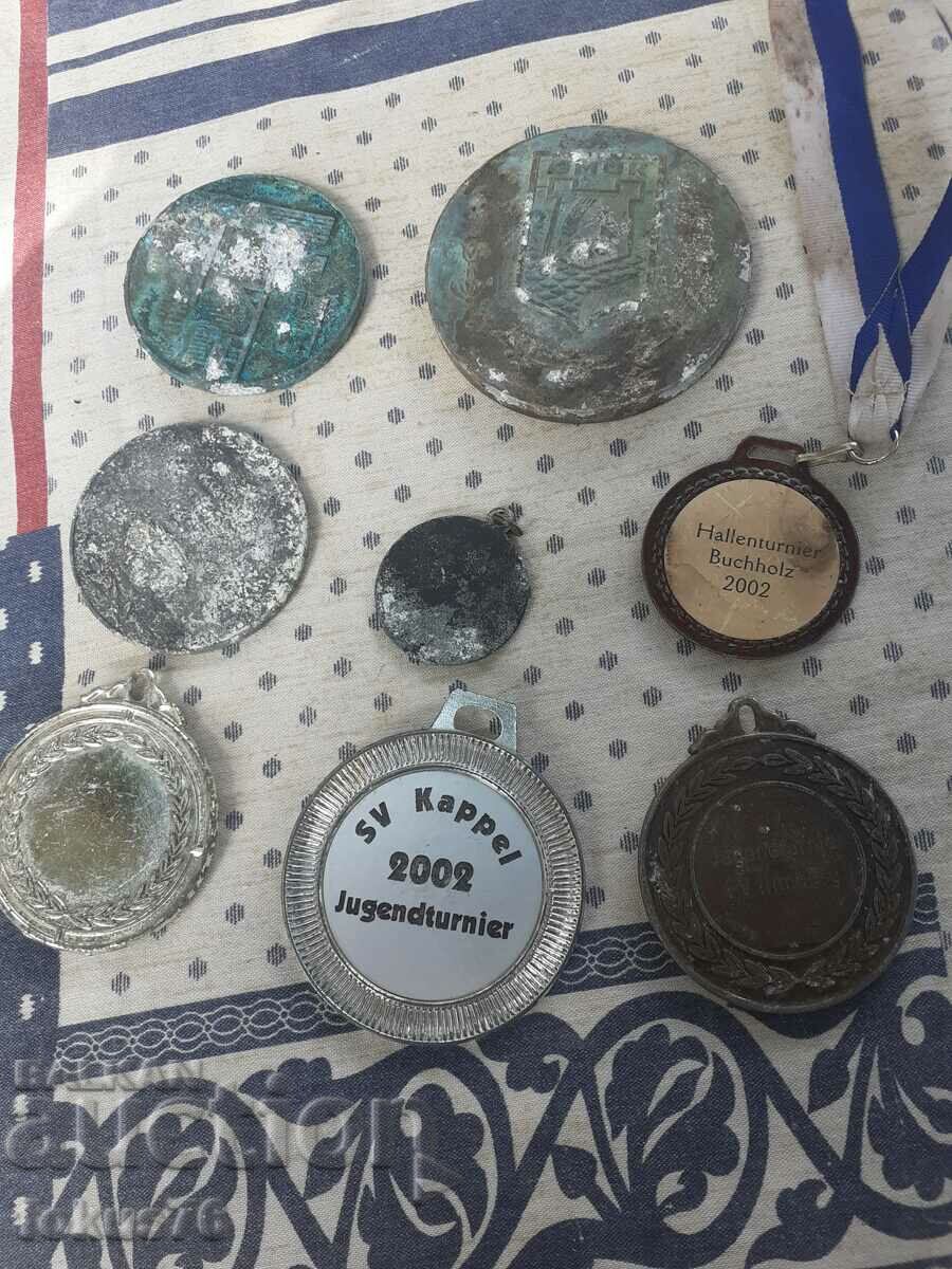 Lot of medals and plaques with price 15.00 BGN | € 7.67 Lot of medals and plaques with price 15.00 BGN | € 7.67