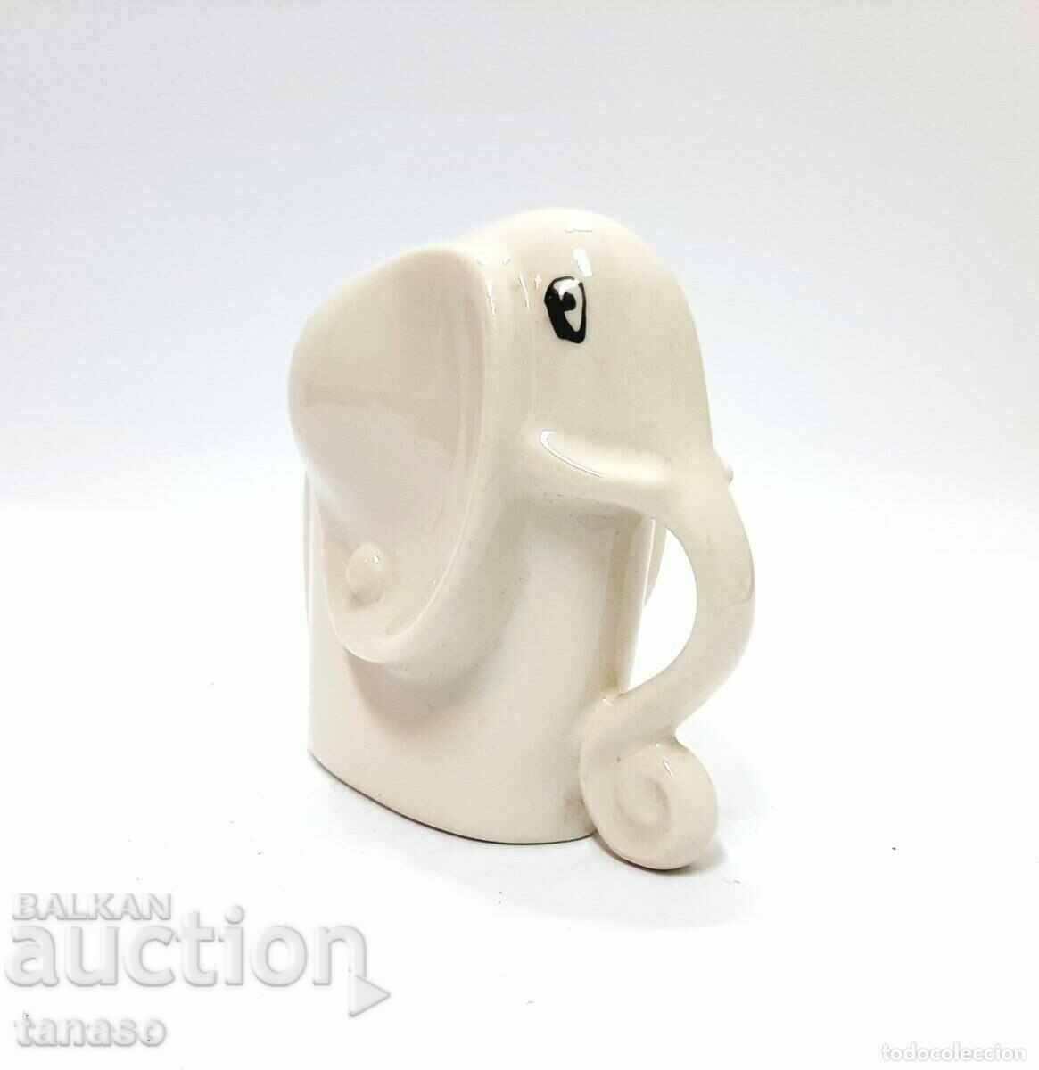 Porcelain figurine of a baby elephant (12.2) with price 30.00 BGN | € 15.34 Porcelain figurine of a baby elephant (12.2) with price 30.00 BGN | € 15.34