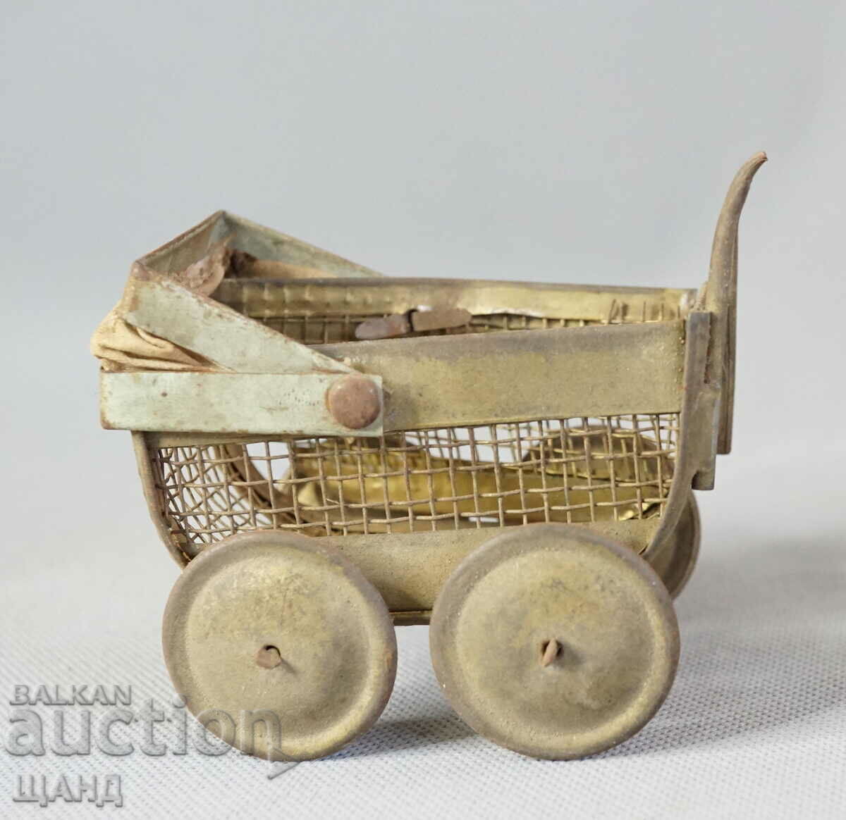 Old metal toy model baby carriage doll