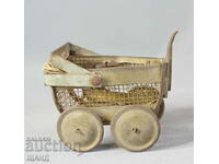 Old metal toy model baby carriage doll