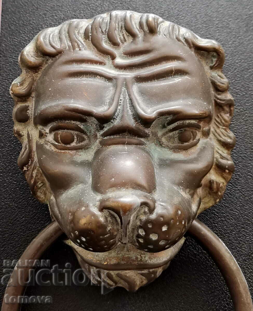 Old bronze solid gate knocker