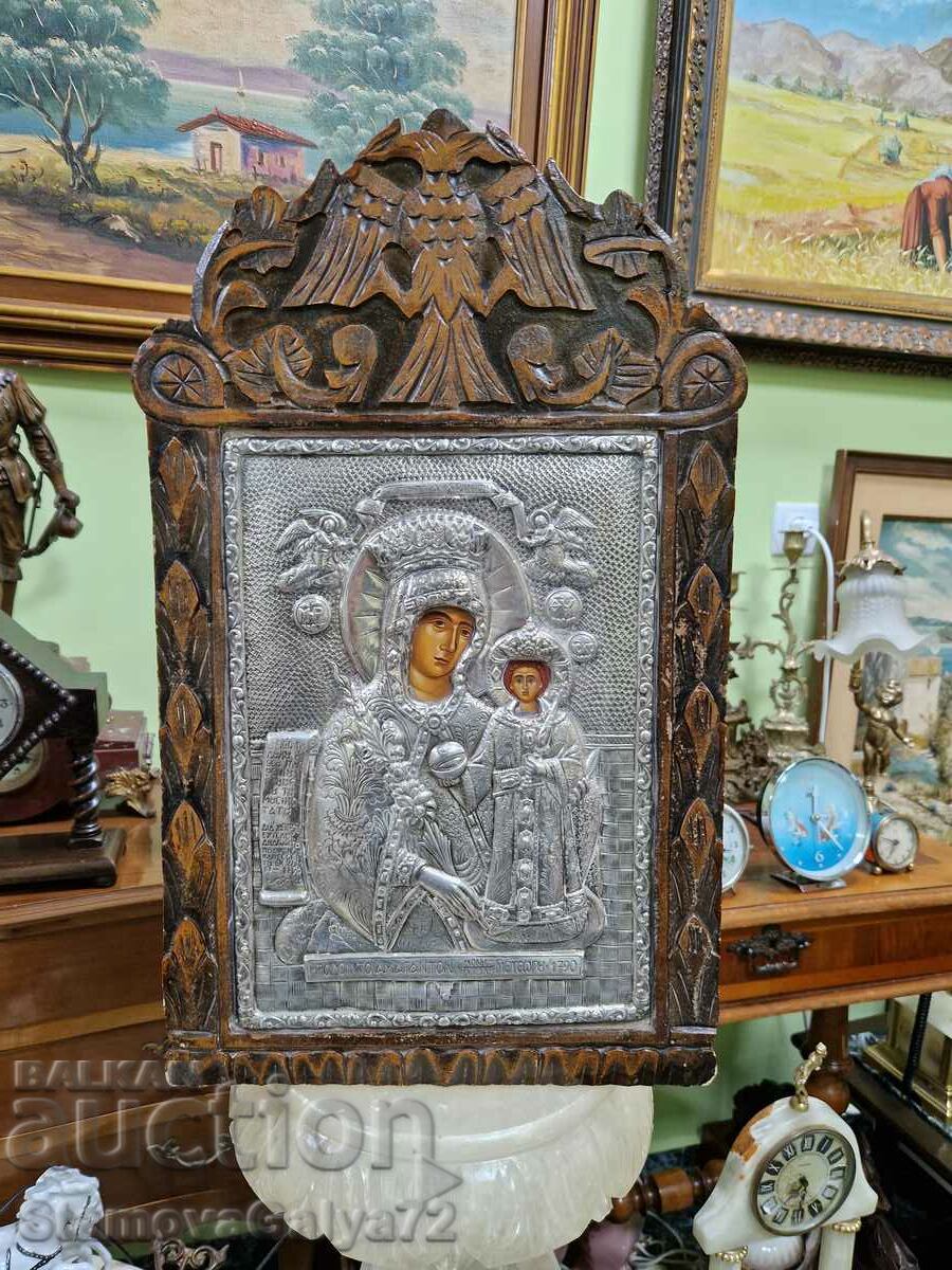 Old superb silver icon with wood carving