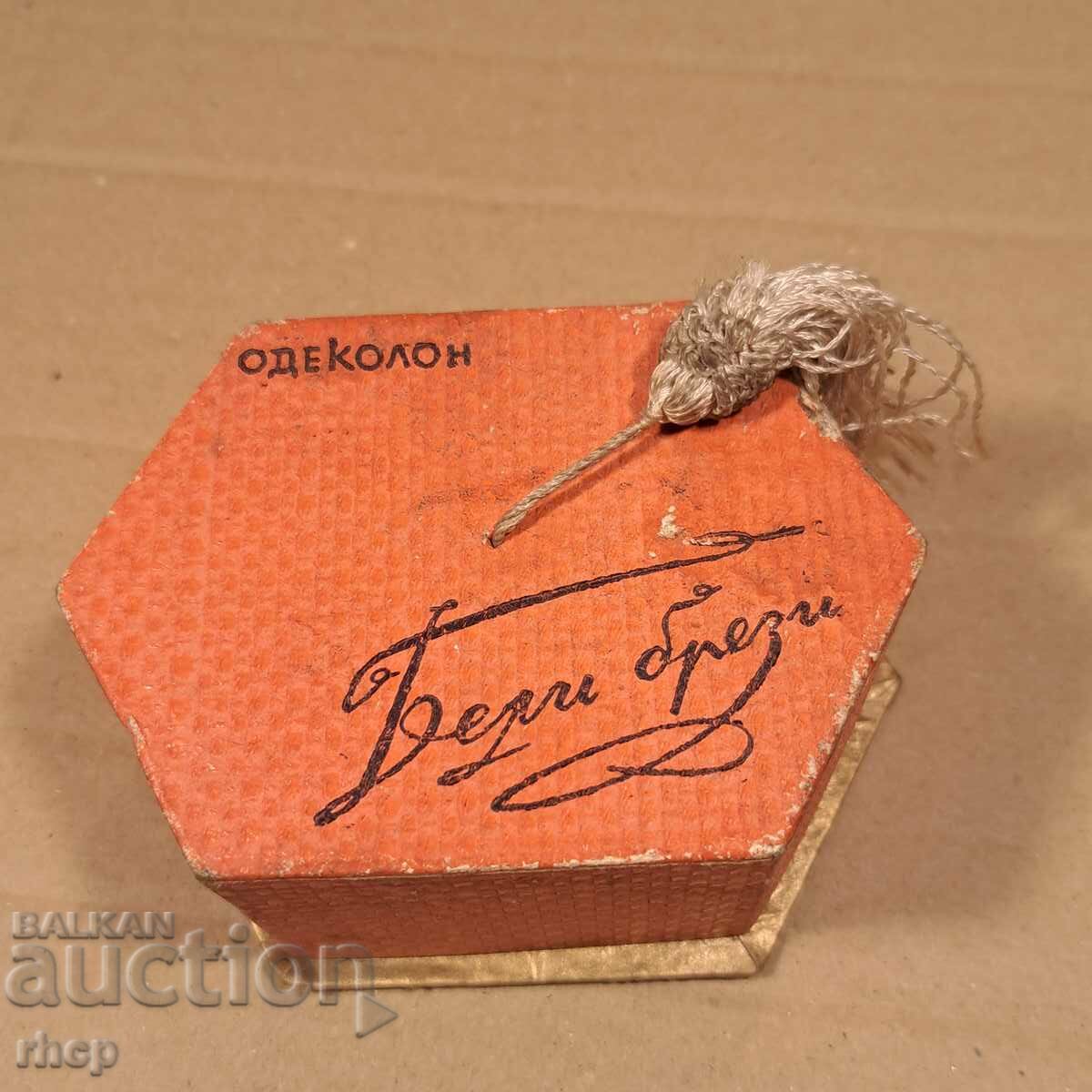 White birches box of old Bulgarian cologne with tassel