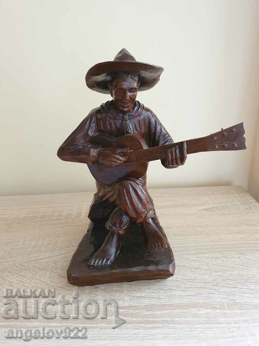 A solid wooden figure figurine