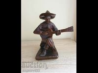 A solid wooden figure figurine