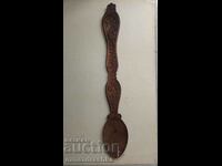 Large carved wooden spoon