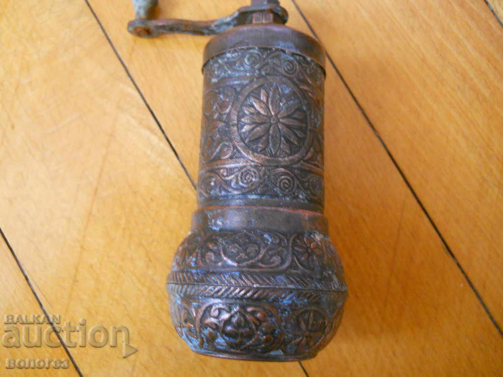 Old bronze pepper mill