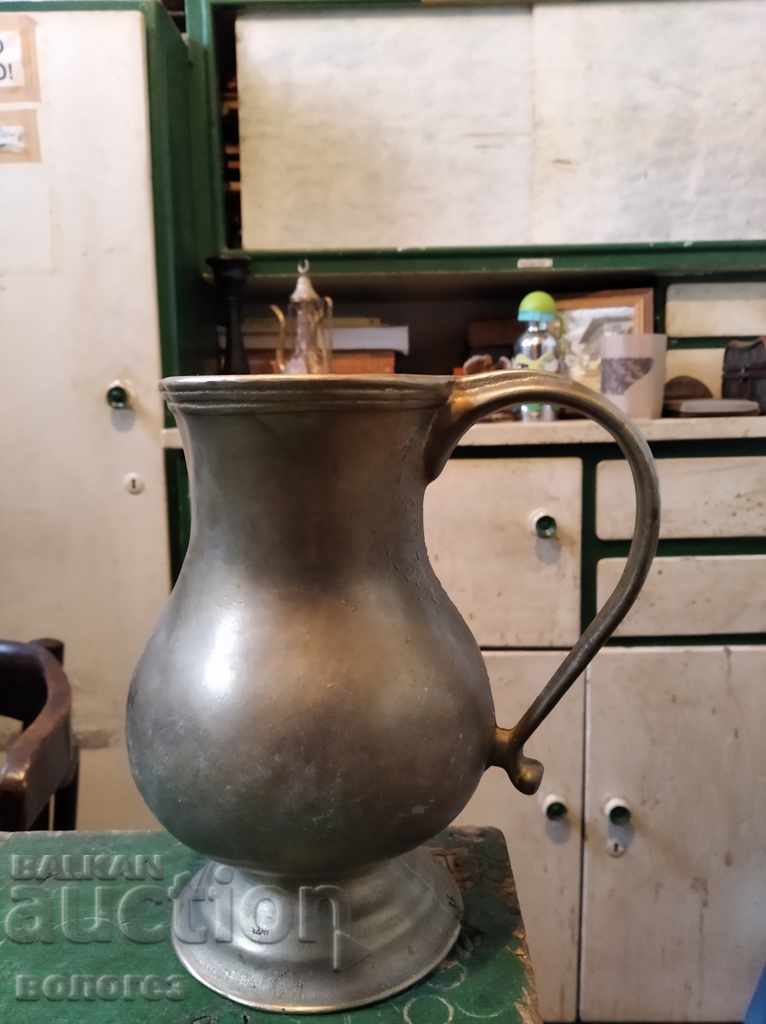 Old bronze jug