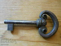 Vintage hand forged chest of drawers key