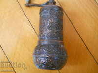 Old bronze pepper mill