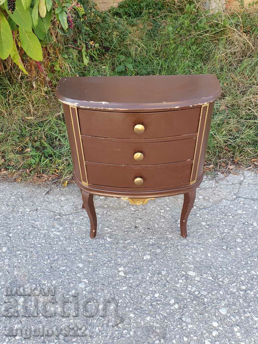 A small wooden chest of drawers!