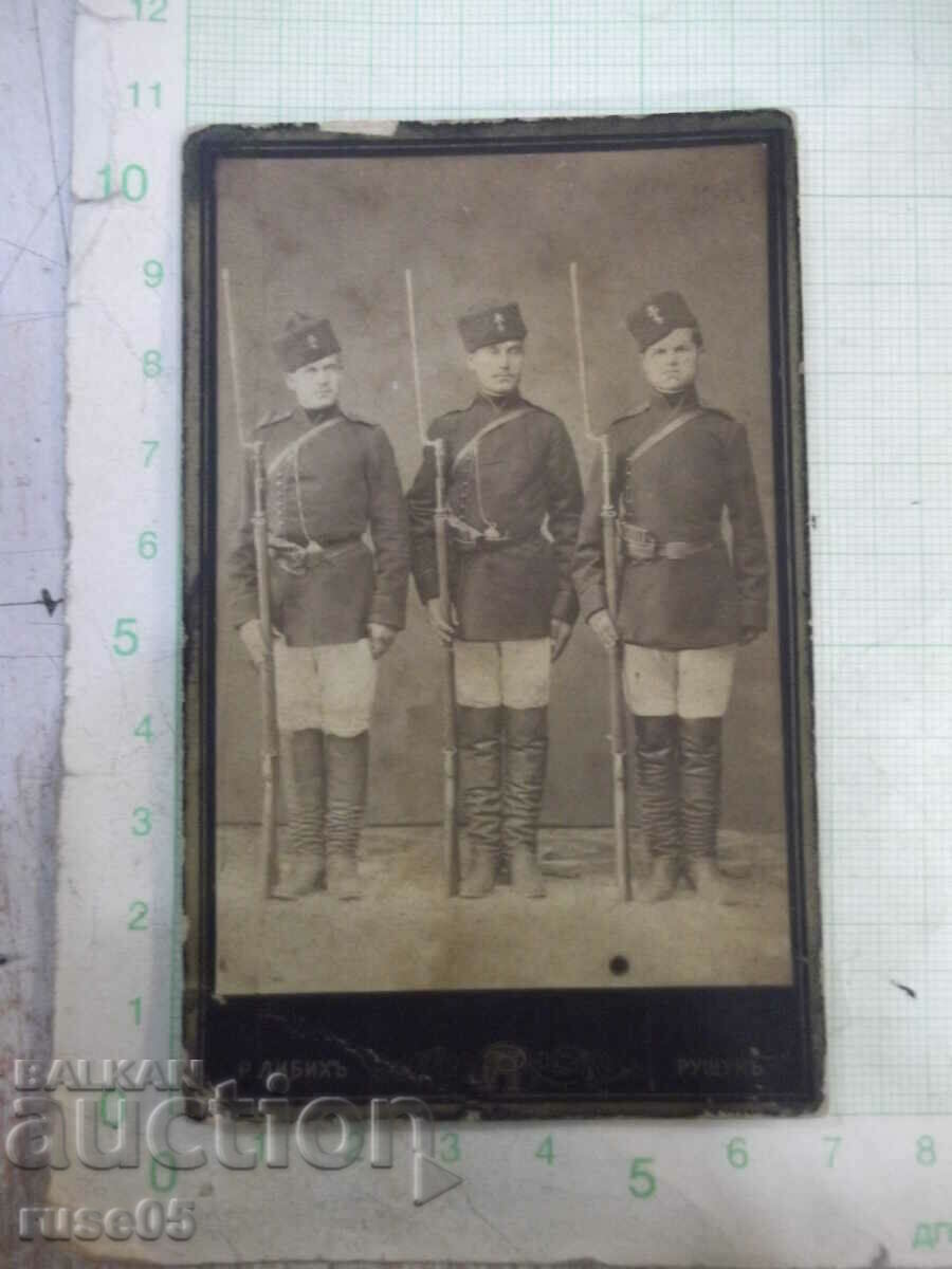 Old photo of three guardsmen