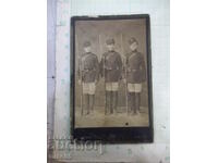 Old photo of three guardsmen