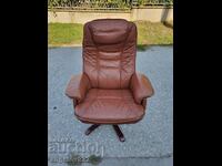 Beautiful solid leather swivel chair with sleep option!