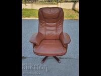 Beautiful solid leather swivel chair with sleep option!