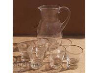 Jug set with 6 hand-engraved cups.