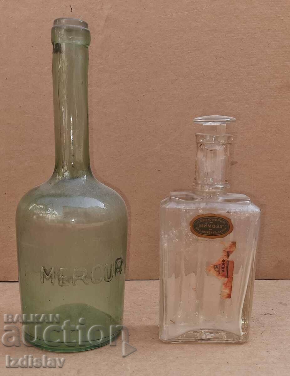 Two antique glass bottles