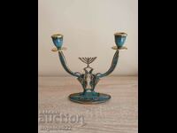 A beautiful solid bronze candle holder!