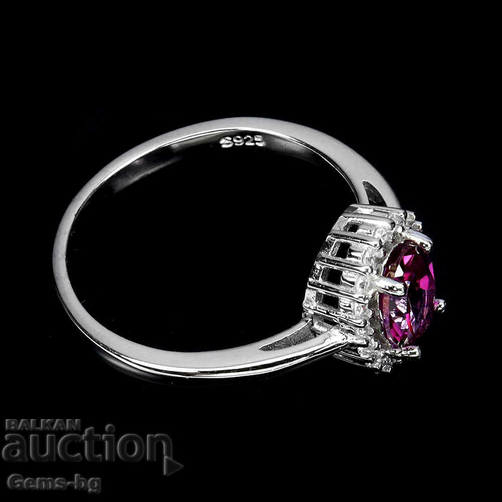 Auction Silver ring with natural topaz and zirconium Auction Silver ring with natural topaz and zirconium