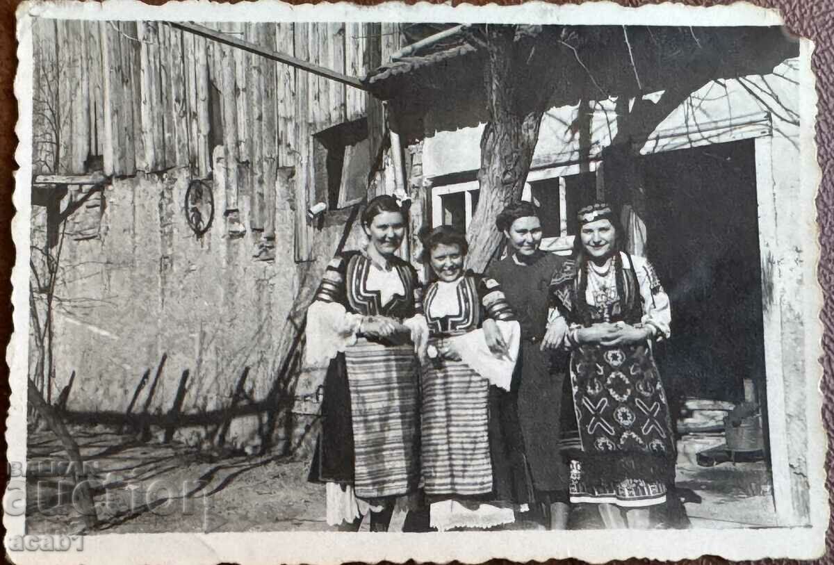 Women in traditional costumes