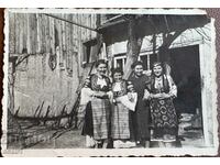 Women in traditional costumes