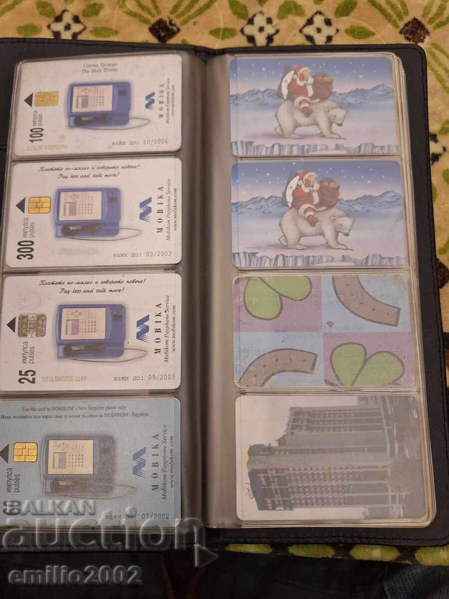 Auction 32 photo cards in a binder Auction 32 photo cards in a binder