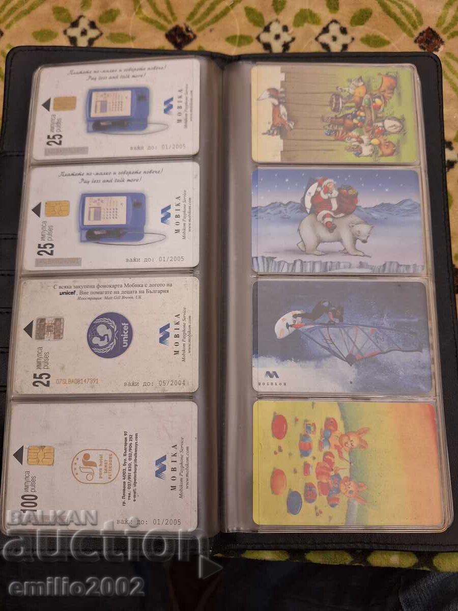 Delivery of 32 photo cards in a binder Delivery of 32 photo cards in a binder