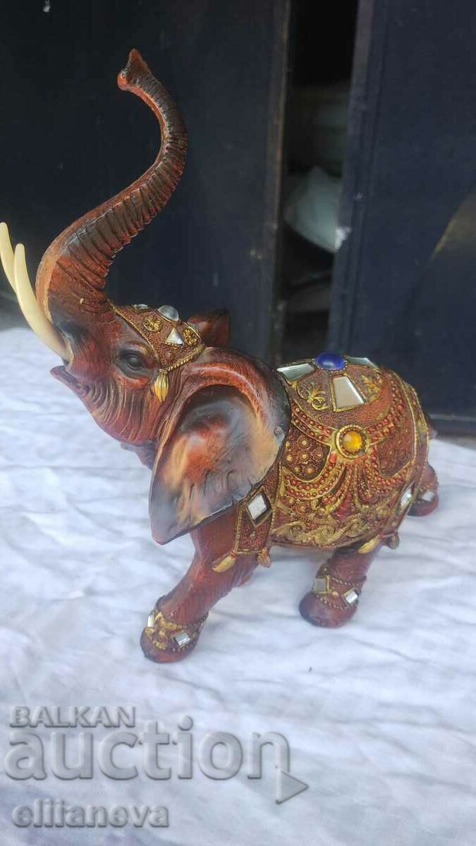 Wooden elephant with stones 20 cm with price 120.00 BGN | € 61.36