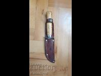 Old hunting knife with cane