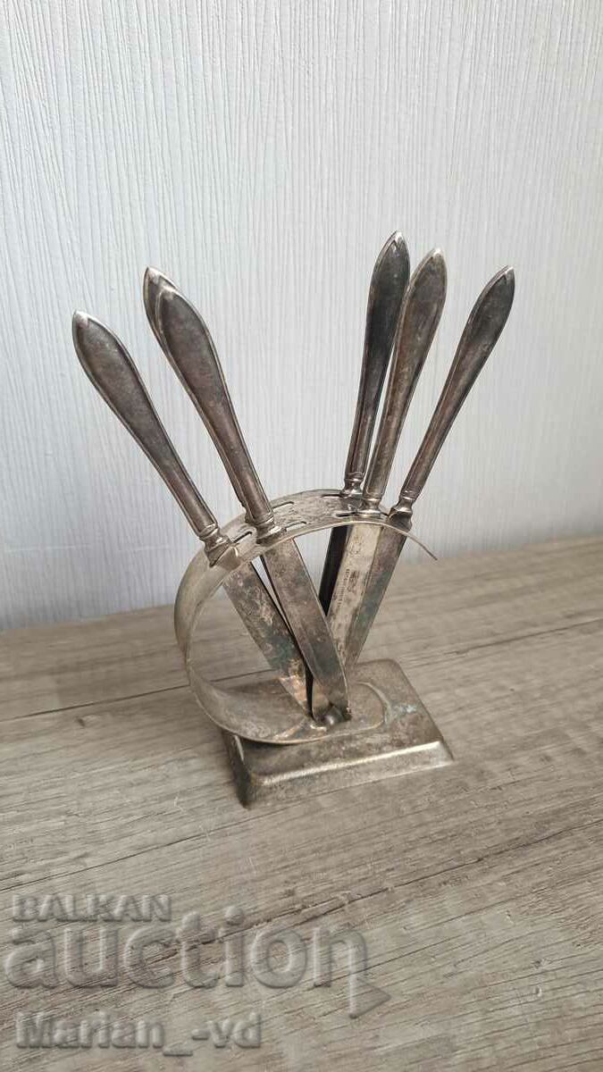 Old silver plated fruit knives with stand