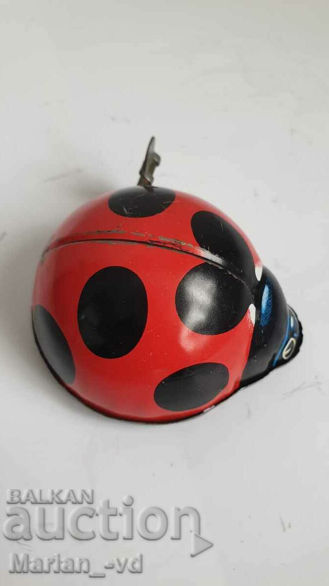 Аукцион Навиваща се тенекиена играчка Калинка Yone Japan Аукцион Навиваща се тенекиена играчка Калинка Yone Japan