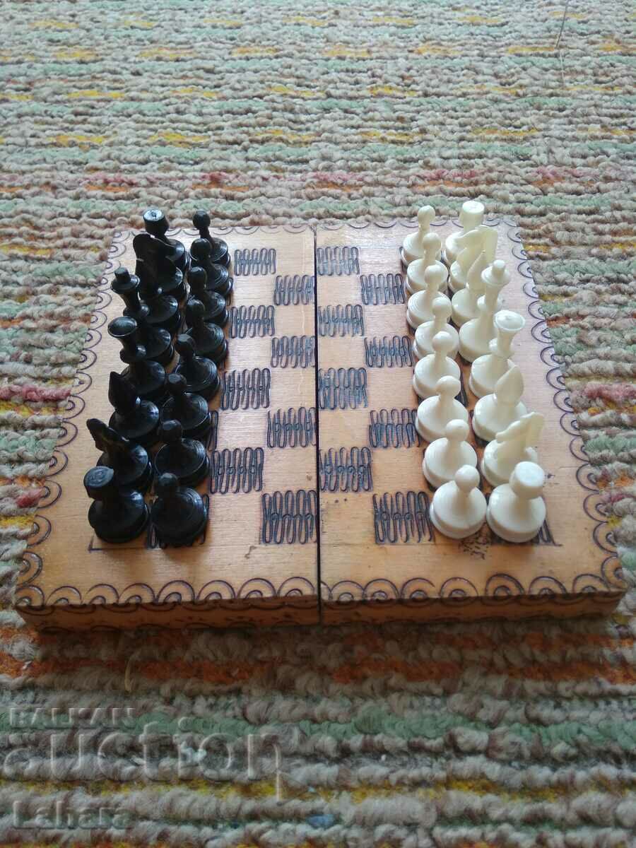 Small wooden chess with plasma figures