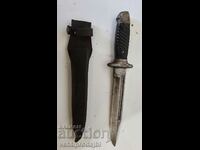 Military knife with leather sheath