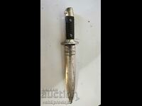 Military knife with metal handle