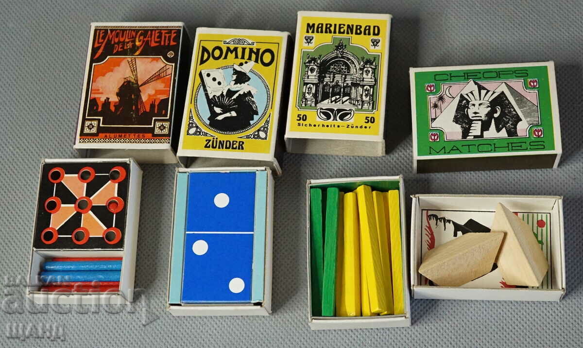 Old toy wooden puzzles in matchboxes