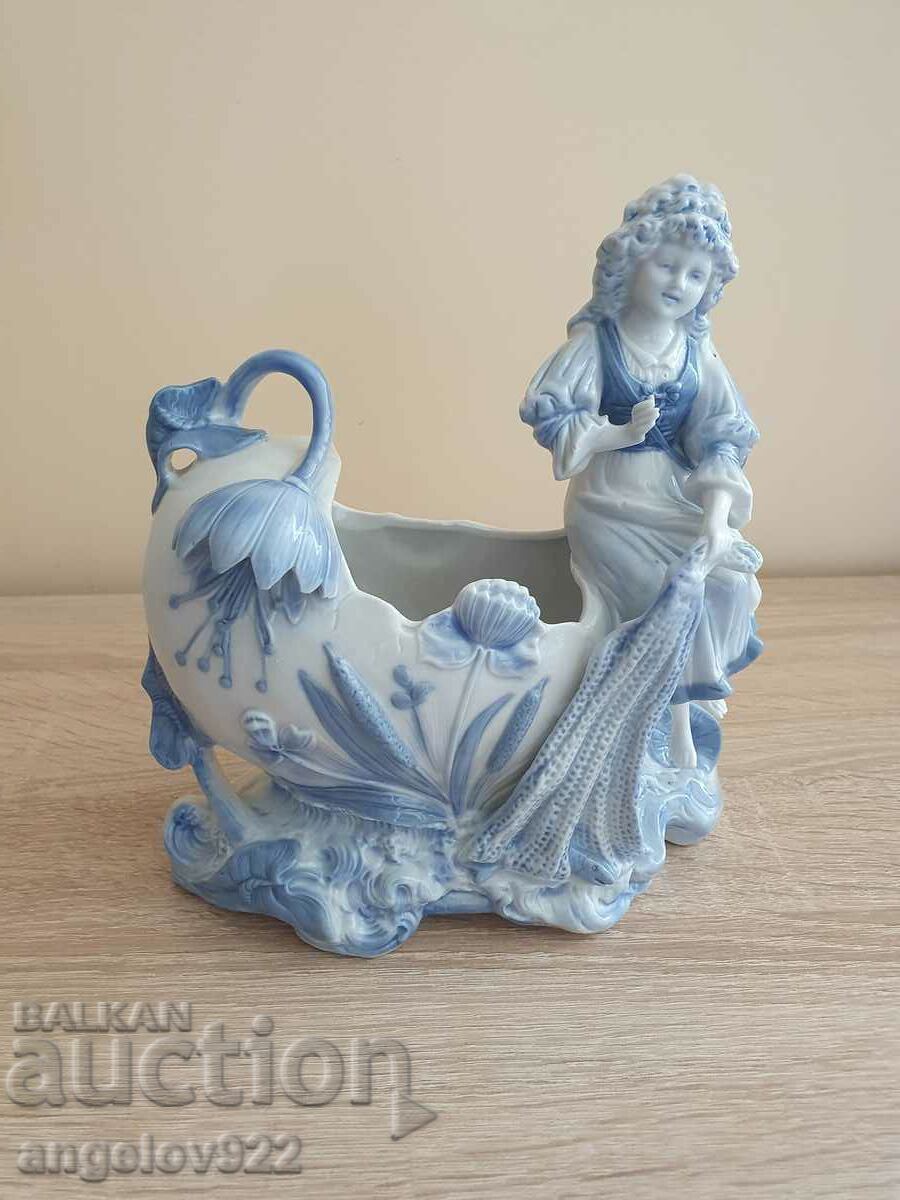 Beautiful porcelain figure statuette