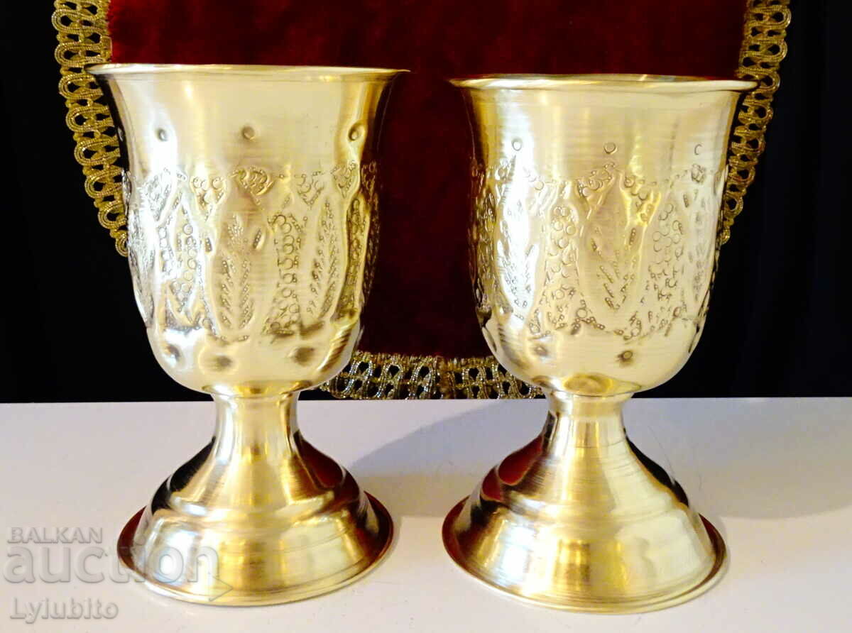 Persian double-bottomed and walled brass cups.