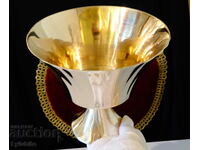 Bronze fruit bowl 1 kg. on a chair