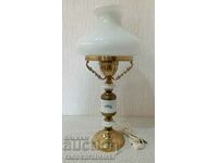 A beautiful vintage lamp with a white glass shade