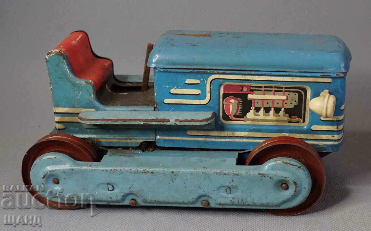 Old Czech metal mechanical toy tractor model