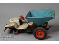 Old German metal mechanical toy model dump truck