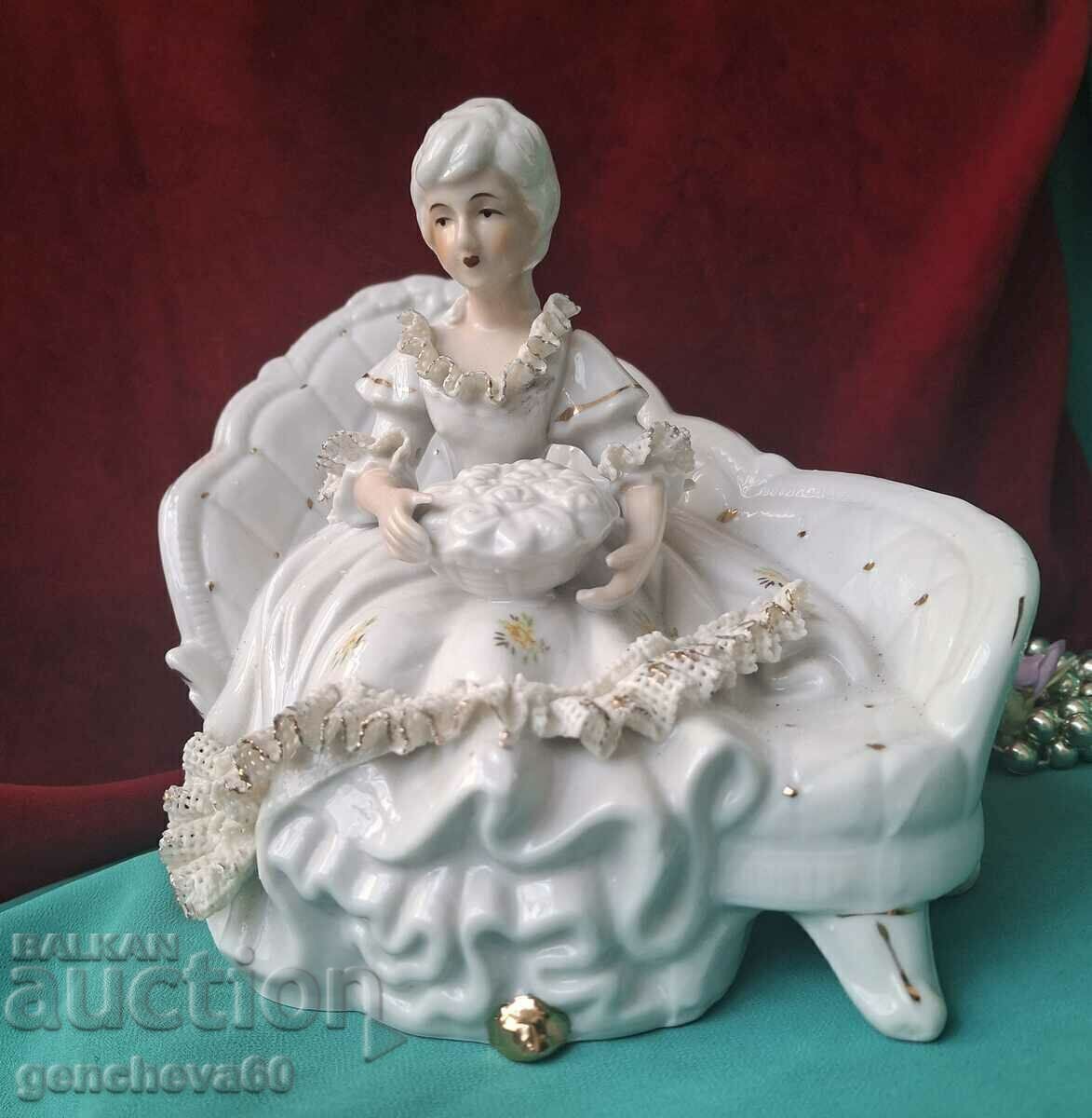 Auction Porcelain Victorian figurine, "Lady on the Couch" Auction Porcelain Victorian figurine, "Lady on the Couch"
