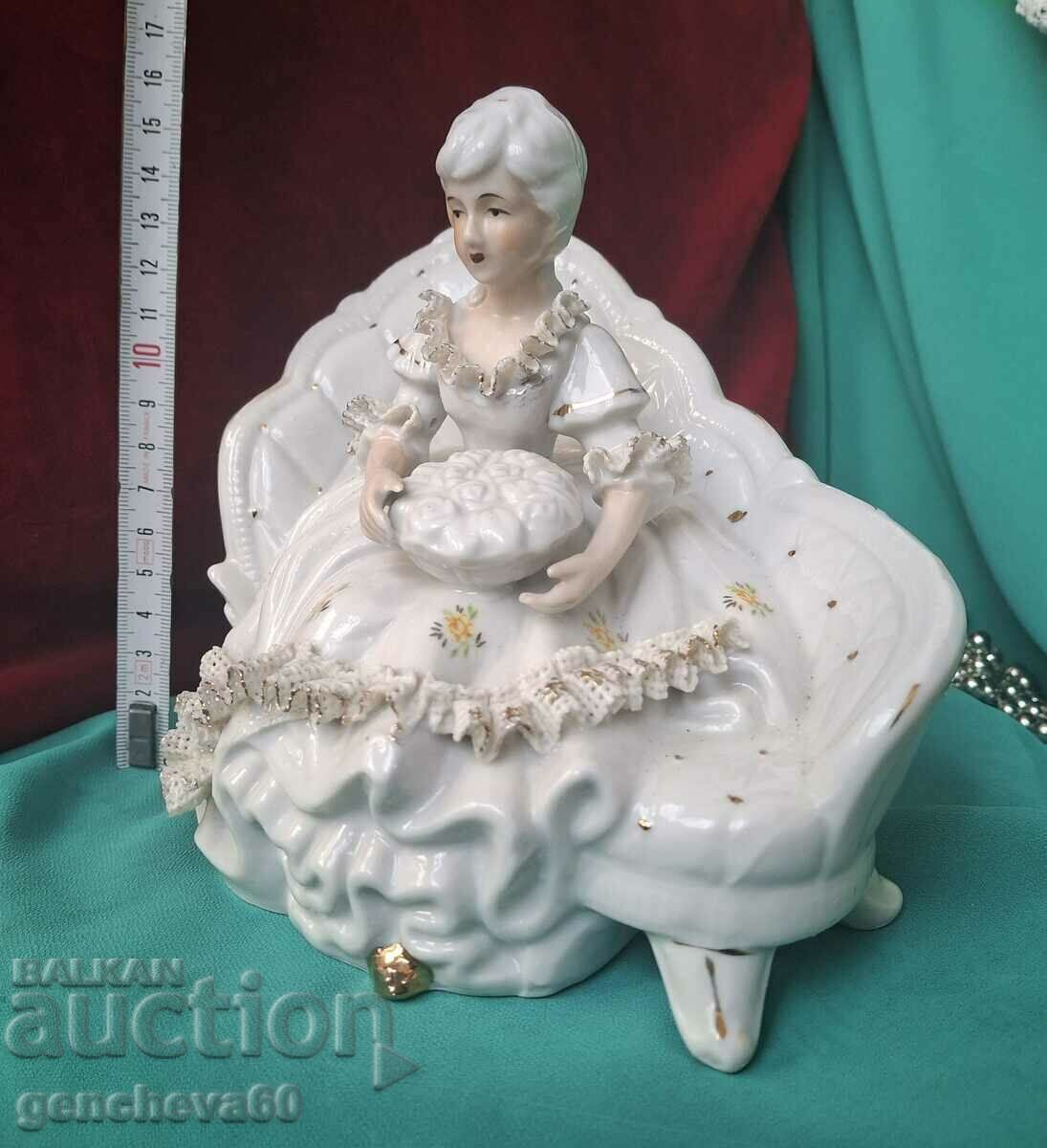 Porcelain Victorian figurine, "Lady on the Couch"